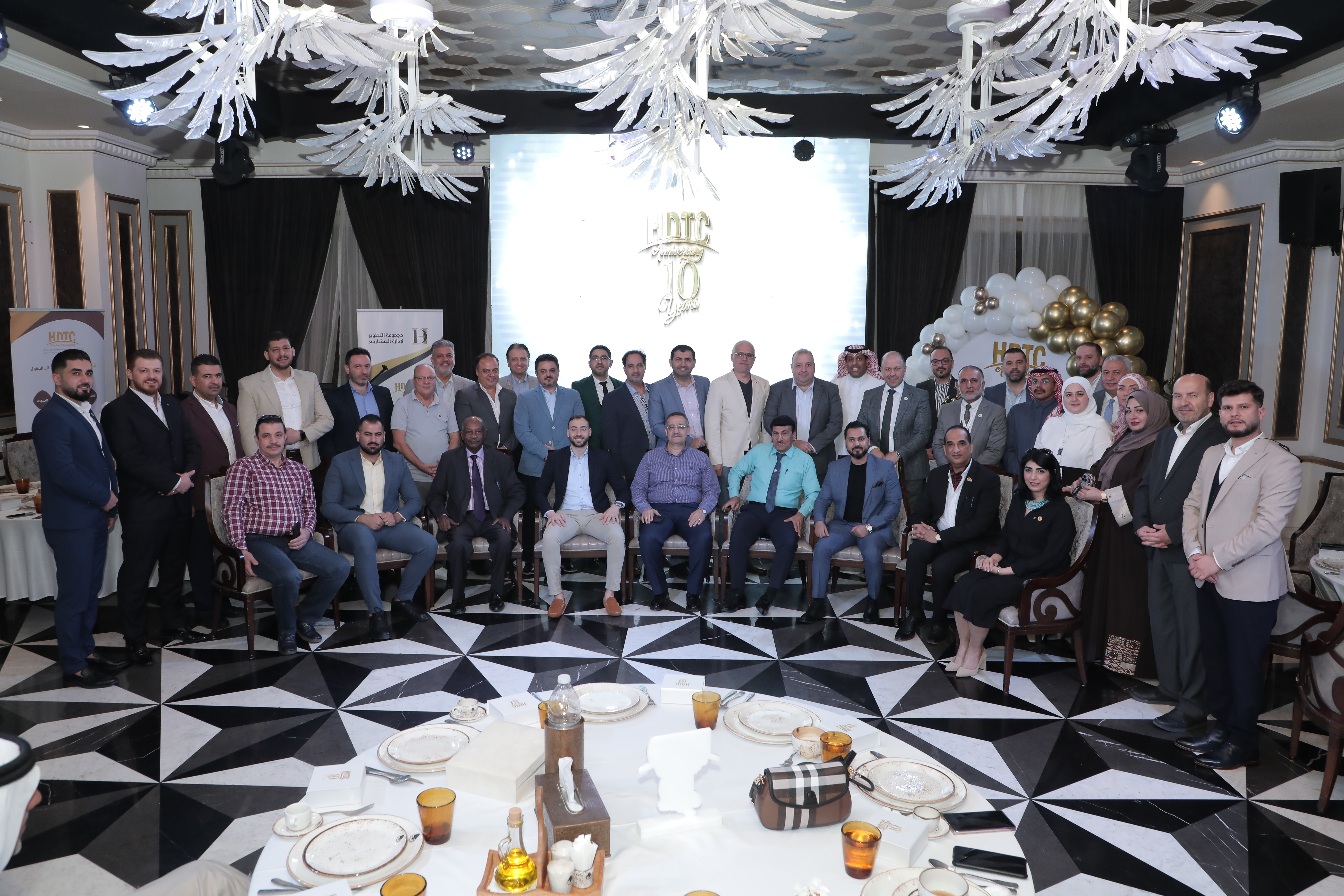 A ceremony honoring the employees, trainers and consultants of the Project Management Development Group for the year 2022